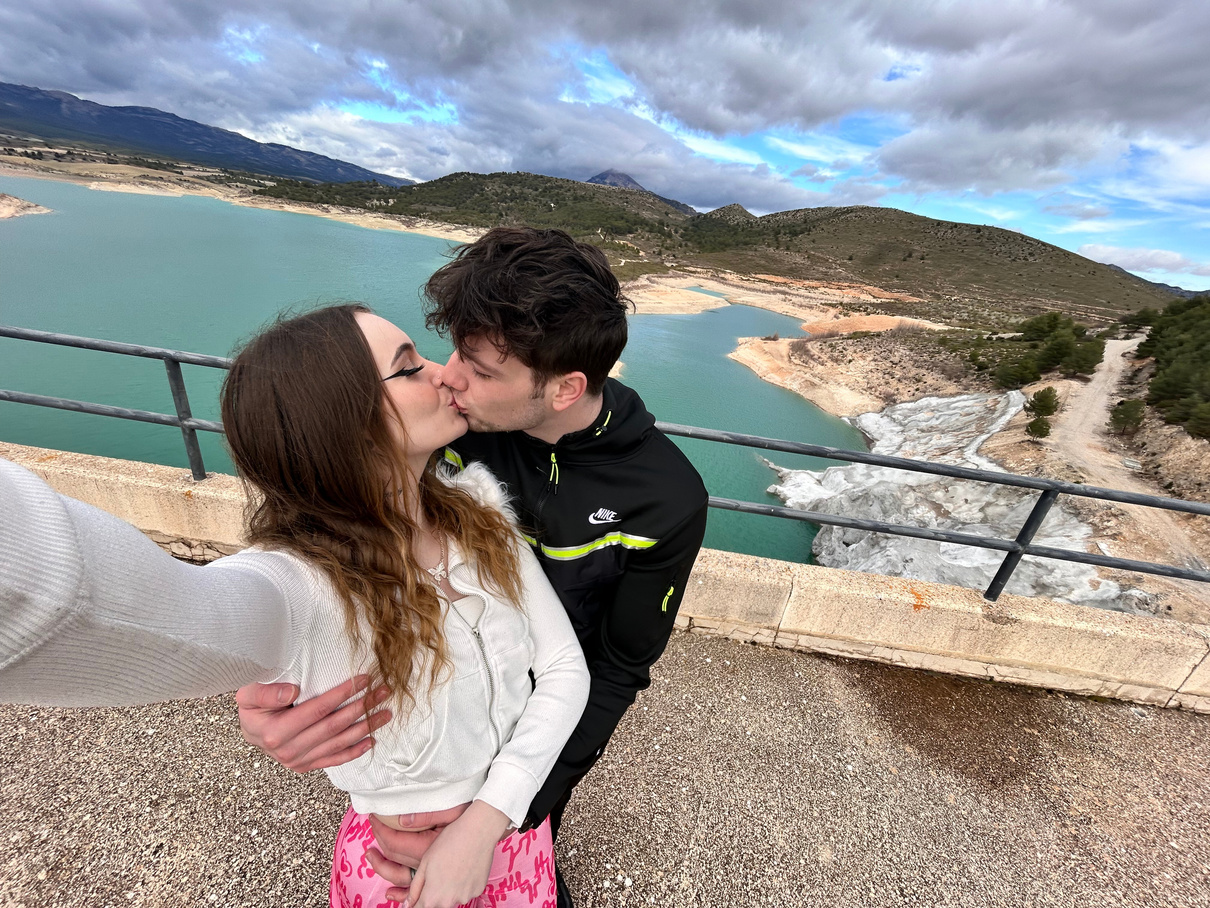 Maria and Setu Kissing with water in the background